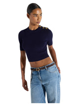 Top in maglia con dettagli gioiello