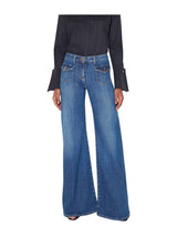Jeans a zampa con taschini